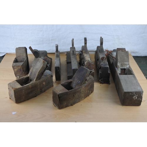 289 - A large lot of antique wood planes.