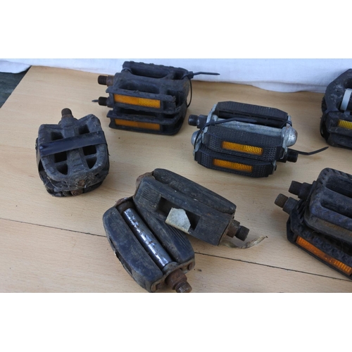 291 - A large lot of vintage bicycle pedals etc