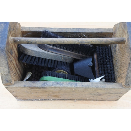 293 - A vintage pine storage trug and a lot of shoe brushes and more.