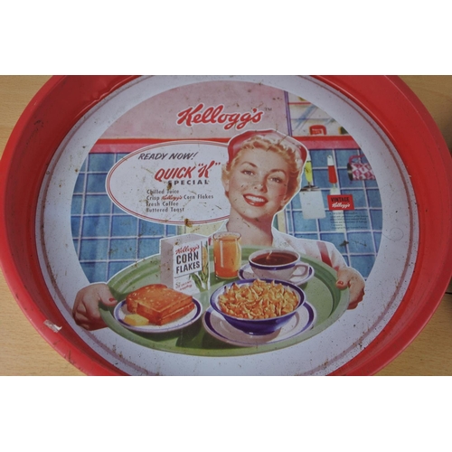 298 - A vintage Coca Cola tray and a vintage Kellogg's tray.