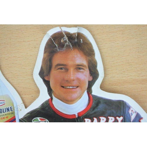 79 - A vintage advertising sticker for Texaco motor oil, autographed by Barry Sheene. Approx 28x19cm.