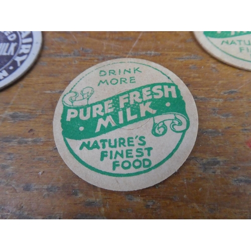 300 - A cp;;ectopm of vintage Monaville Dairy, Portadown & Uppertown Diary Farm, Larne milk bottle tops an... 