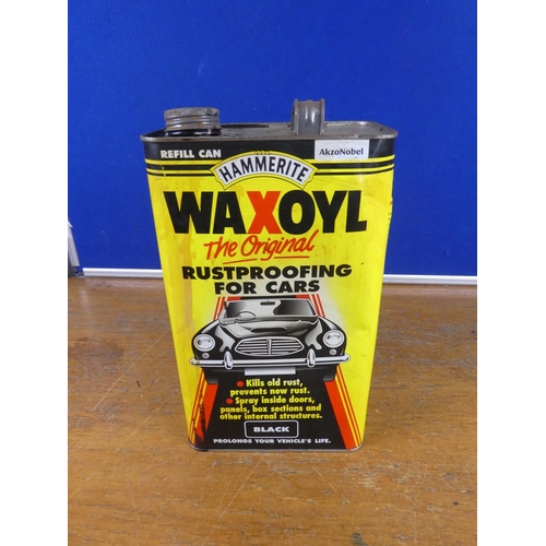 323 - A vintage Hammerite Waxoyl can. Approx 29cm.