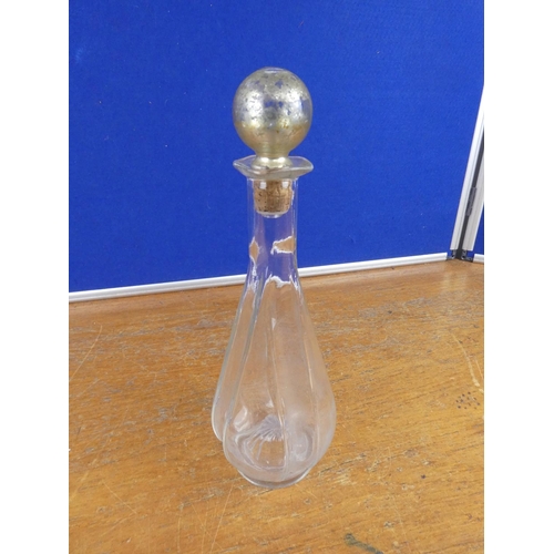 329 - An antique glass decanter.