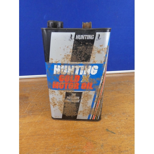 332 - A vintage Hunting Gold X motor oil can. Approx 29cm.