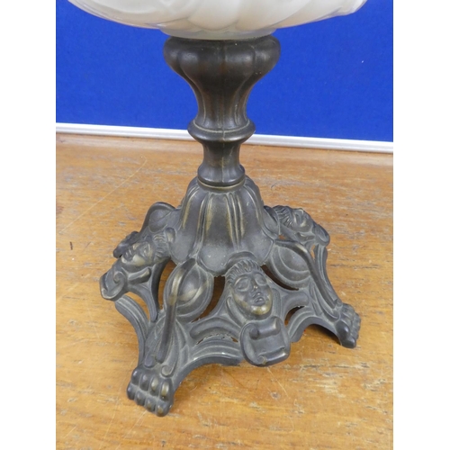 334 - A stunning antique oil lamp base with milk glass font decorated with birds. Approx 37cm.