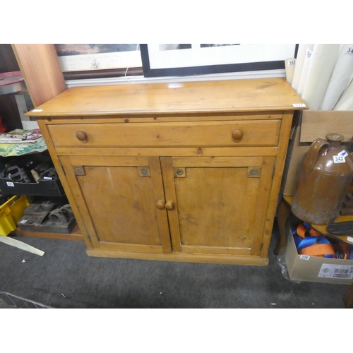 337 - A pine two door sideboard.