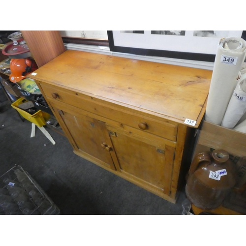 337 - A pine two door sideboard.