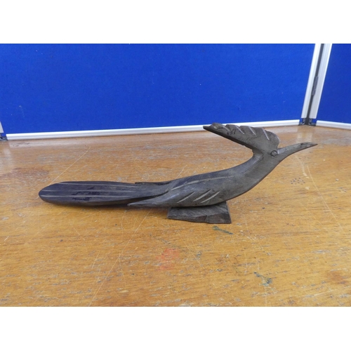 341 - A wooden ornament of a bird.