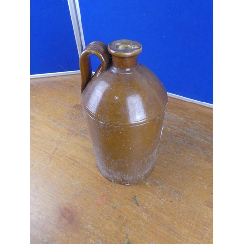 342 - An antique stoneware flagon. Approx 35cm.