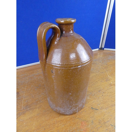 342 - An antique stoneware flagon. Approx 35cm.