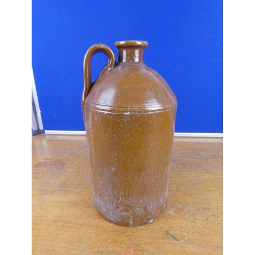 342 - An antique stoneware flagon. Approx 35cm.