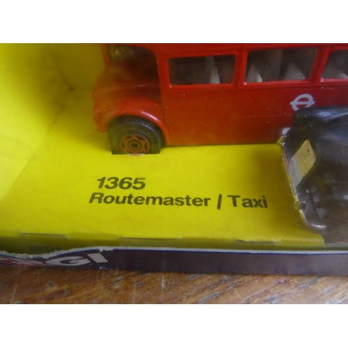 364 - A boxed Corgi 1365 Routemaster/Taxi and a boxed Rio 1914 Fiat Autocarro Civille vehicle.