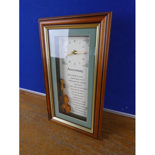 370 - A boxed Irish anniversary clock. Approx 30x14cm.