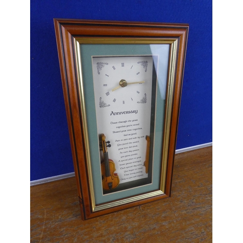 370 - A boxed Irish anniversary clock. Approx 30x14cm.