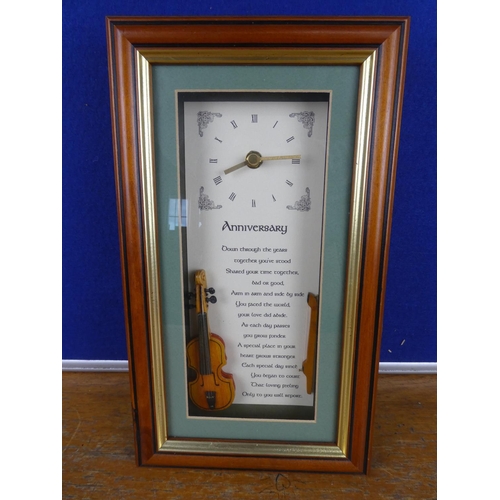 370 - A boxed Irish anniversary clock. Approx 30x14cm.