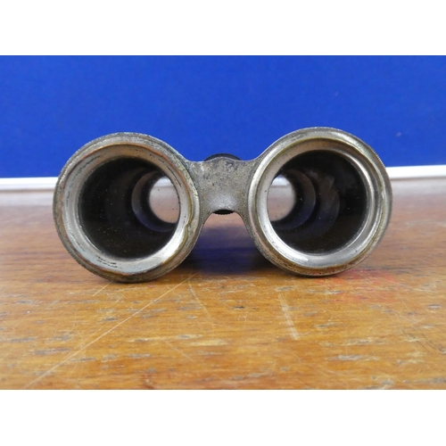 378 - A pair of vintage field glasses/ binoculars.