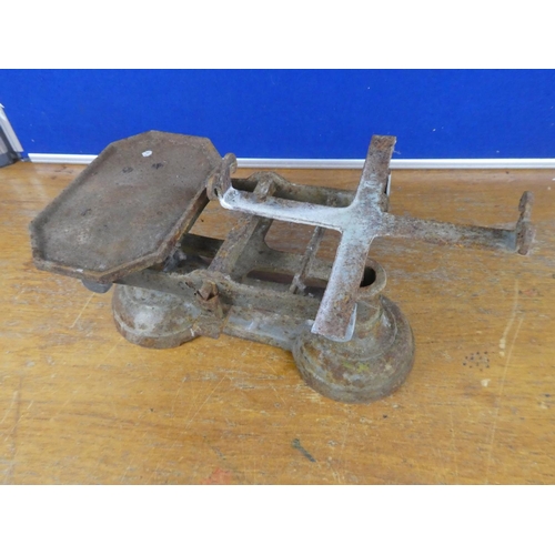 379 - A set of antique weighing scales.