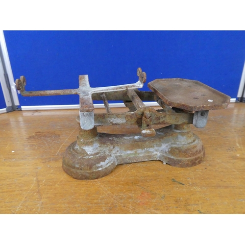 379 - A set of antique weighing scales.