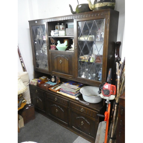 391 - An oak leaded glass display cabinet.