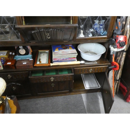 391 - An oak leaded glass display cabinet.