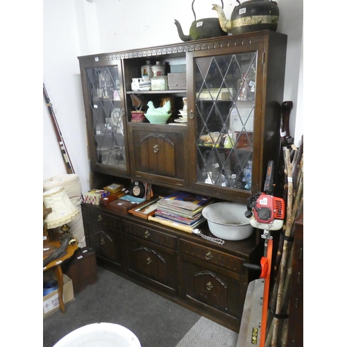 391 - An oak leaded glass display cabinet.