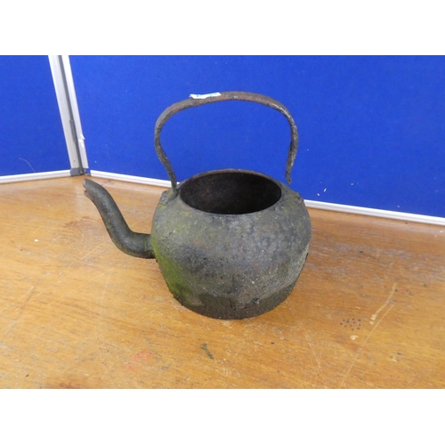 394 - An antique kettle.