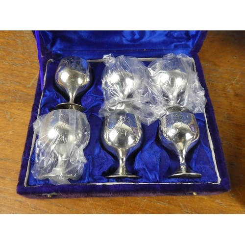 397 - Two vintage boxed set of silver plated small liquor goblets.