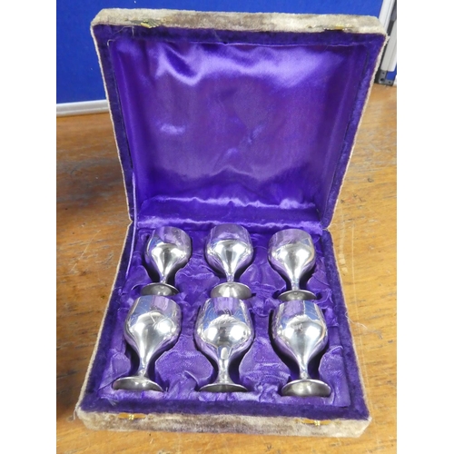 397 - Two vintage boxed set of silver plated small liquor goblets.