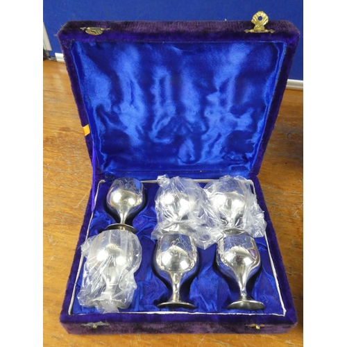 397 - Two vintage boxed set of silver plated small liquor goblets.