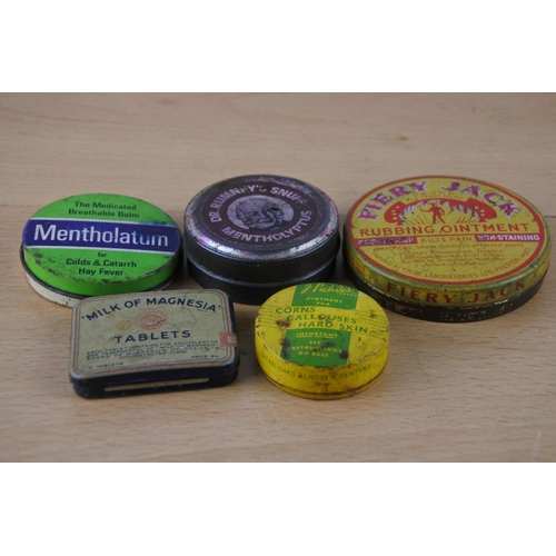 401 - A small vintage Milk of Magnesia tin and four others.