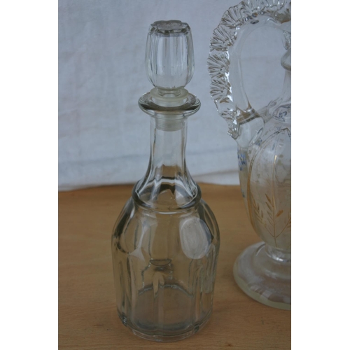 410 - A stunning antique glass decanter with hand painted detail, another decanter and a glass vase,