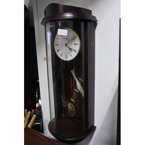 415 - A mahogany and glass domed case Quartz wall clock by Wm Widdop Approx 63cm.