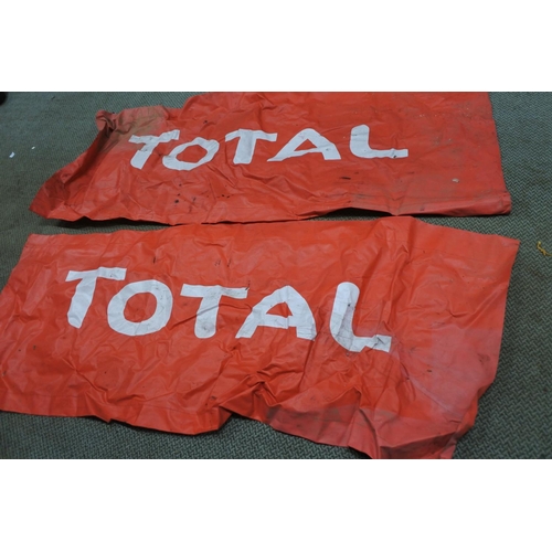 416 - Two large advertising signs for Total.