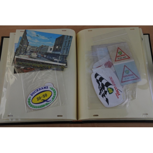 435 - An interesting folder of motorcycling memoribila to include fabric badges, photographs, a vintage ve... 