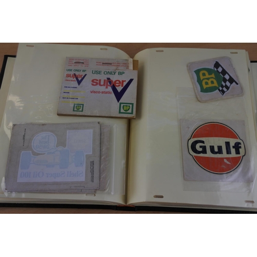 435 - An interesting folder of motorcycling memoribila to include fabric badges, photographs, a vintage ve... 