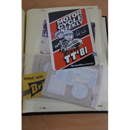 435 - An interesting folder of motorcycling memoribila to include fabric badges, photographs, a vintage ve... 