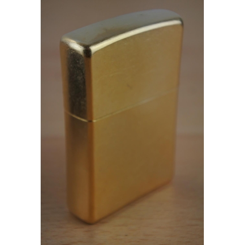 439 - A boxed Zippo lighter.