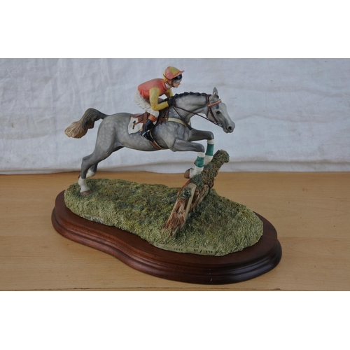 443 - A Border Fine Arts 'The Final Hurdle ' L156 race horse and rider on a wooden plaque signed Anne Wall... 