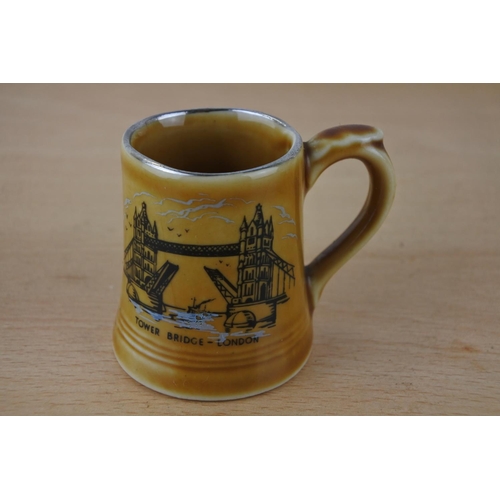 448 - Two Mason's Ironstone dishes and a miniature Wade 'Tower Bridge' tankard.