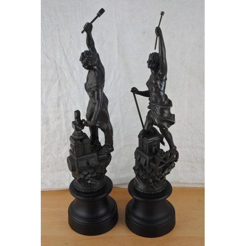 452 - A pair of metal figures on wooden plinths, stamped ASCO Approx 50cm.