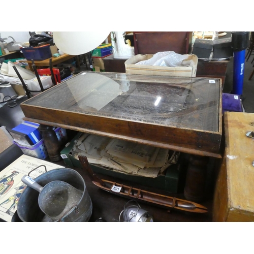 506 - A stunning oak carved coffee table with glass top. Approx 36x86cm.