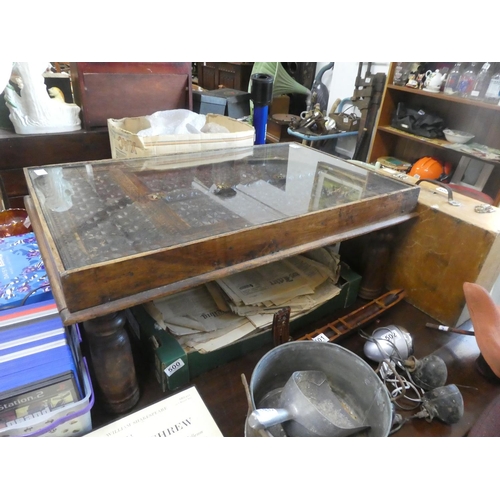 506 - A stunning oak carved coffee table with glass top. Approx 36x86cm.