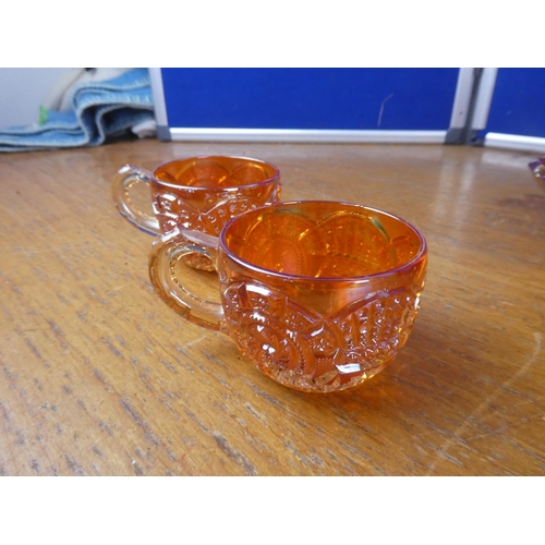 508 - A large lot of vintage carnival glass ware and a vintage amber glass jug.