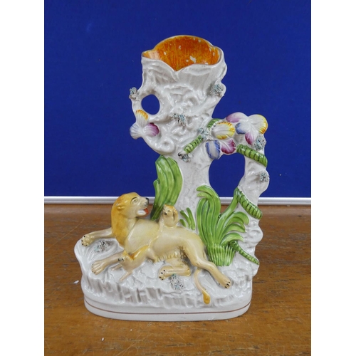 513 - An antique Staffordshire figure.