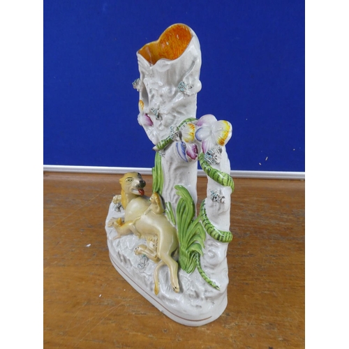 513 - An antique Staffordshire figure.