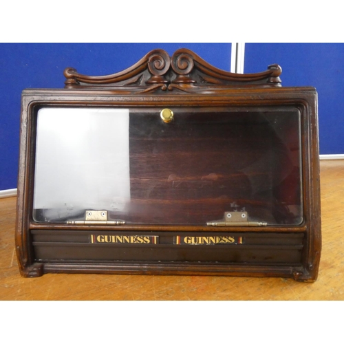 515 - A wood cased tobacco jar storage cabinet. Approx 29x39cm.