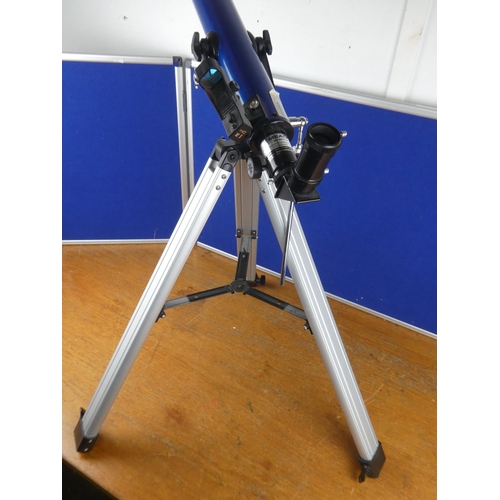 517 - A Meade telescope and tripod base.