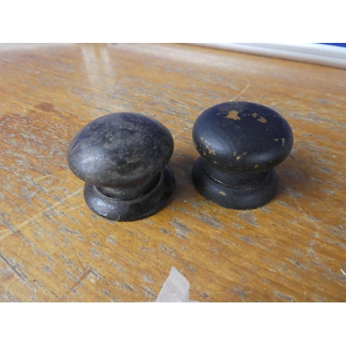 521 - A bag of assorted enamel character furniture knobs and more.