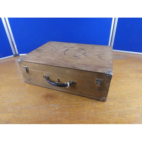 531 - A wooden storage case.